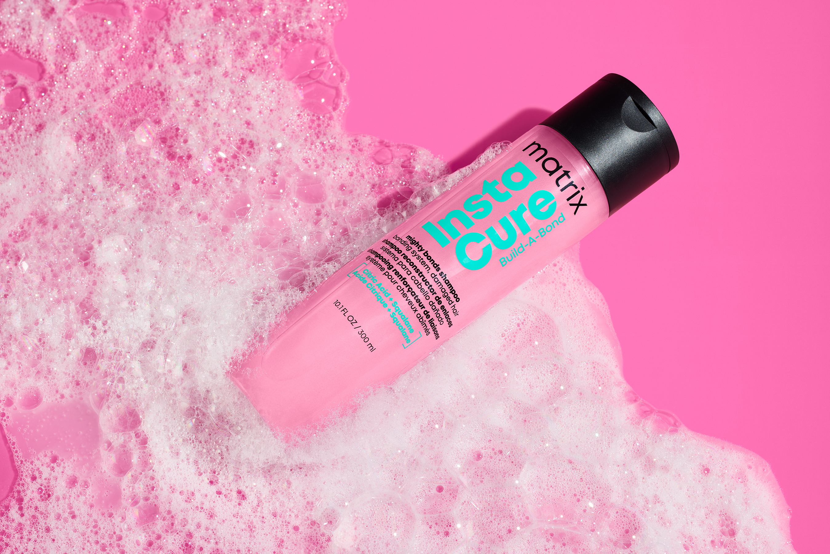 Matrix "Food For Soft" — overhead avocado + green water still life. Same brand, different mood: ingredient-led, playful.